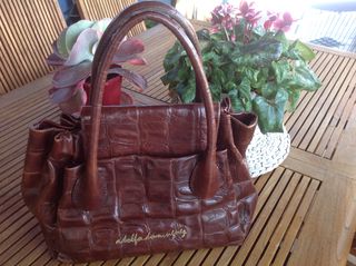 Bolso piel Adolfo Dominguez de segunda mano por 95 EUR en Málaga en WALLAPOP