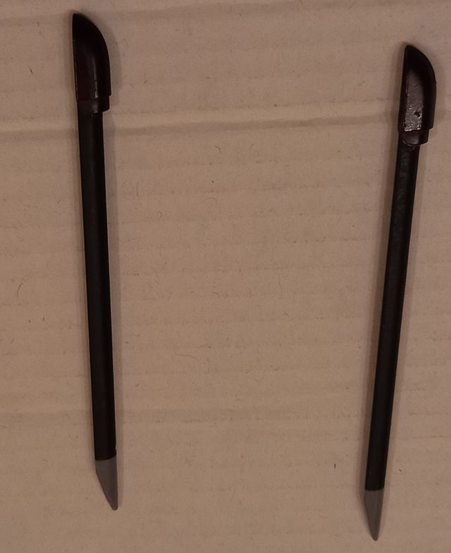 Due telefoni cellulari Nokia XpressMusic 5800 vintage