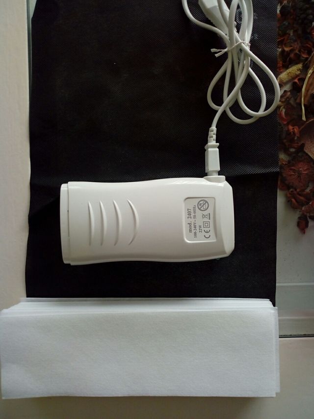 CALENTADOR DE CERA ROLON y 45 bandas