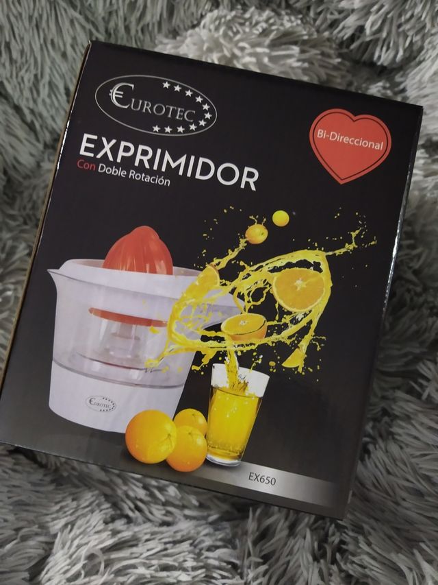 Exprimidor de doble rotación