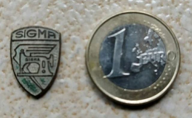 Insignia antigua máquinas de coser Sigma