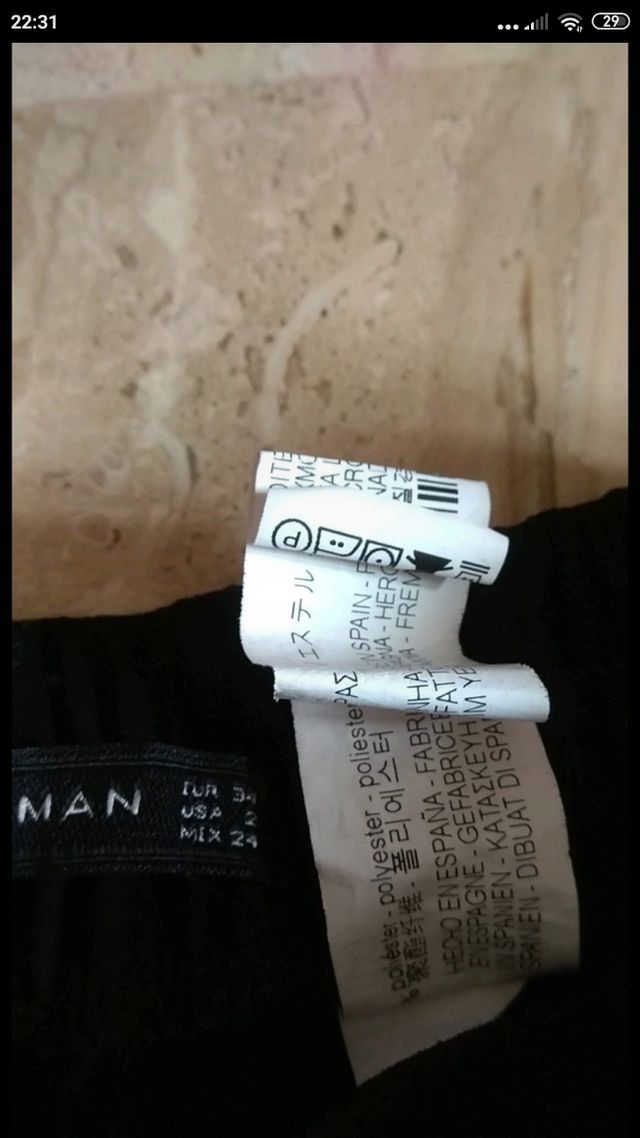 pantalón negro con banda lateral