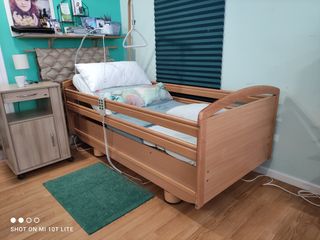 Cama electrica con carro elevador