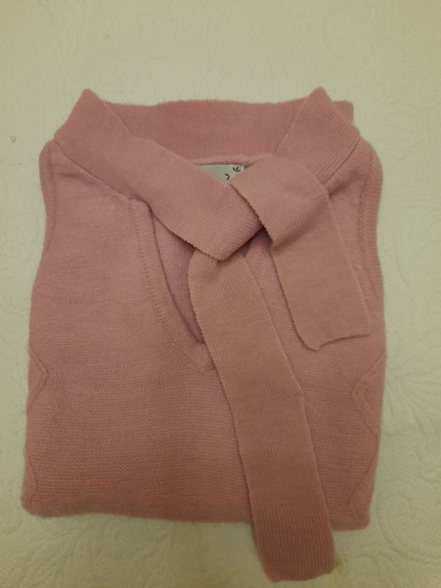 Top de lana impecable.