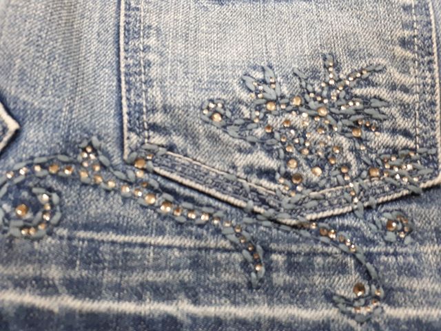 Minifalda vaquera T. 38 con flecos