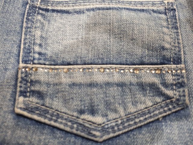 Minifalda vaquera T. 38 con flecos