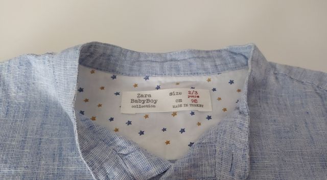Camisa niño de manga corta azul de Zara.