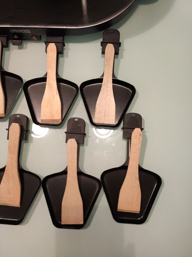 Pedra com fundidor de queijo