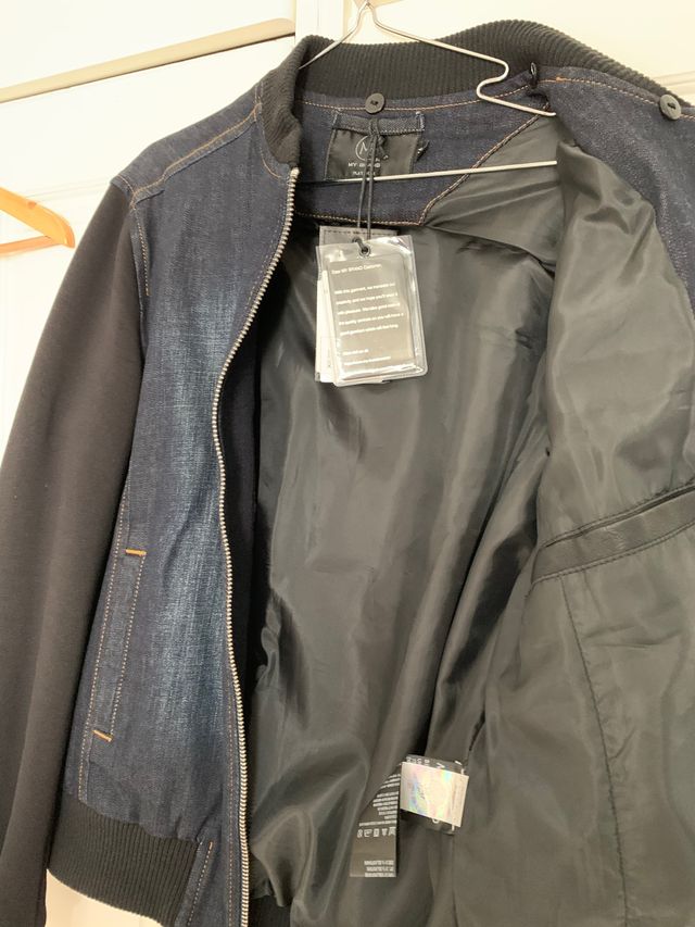 Cazadora vaquera mixta con mangas de abrigo