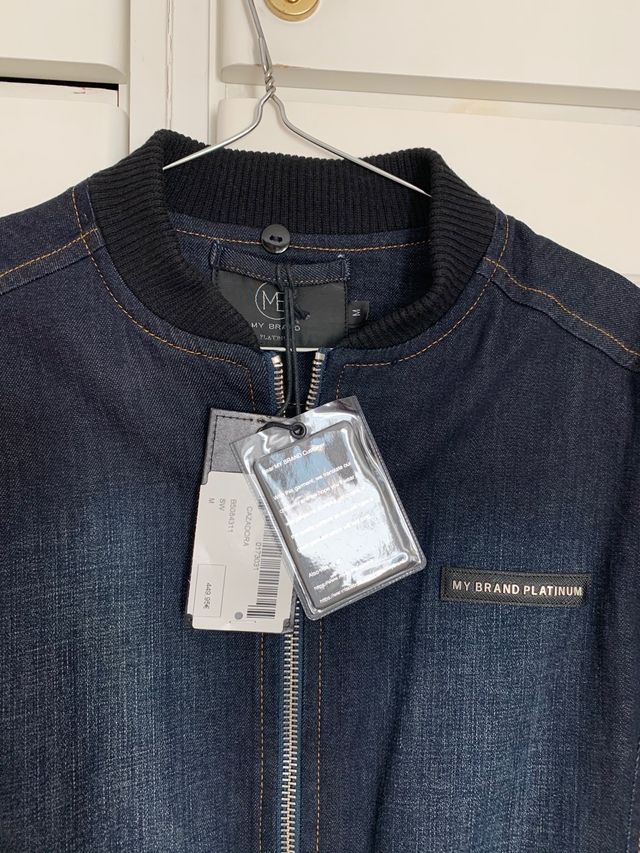 Cazadora vaquera mixta con mangas de abrigo