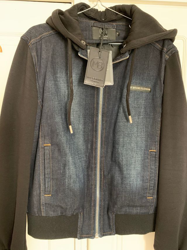 Cazadora vaquera mixta con mangas de abrigo