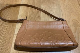 Bolso marrón Tous de segunda mano por 15 EUR en Ourense en WALLAPOP
