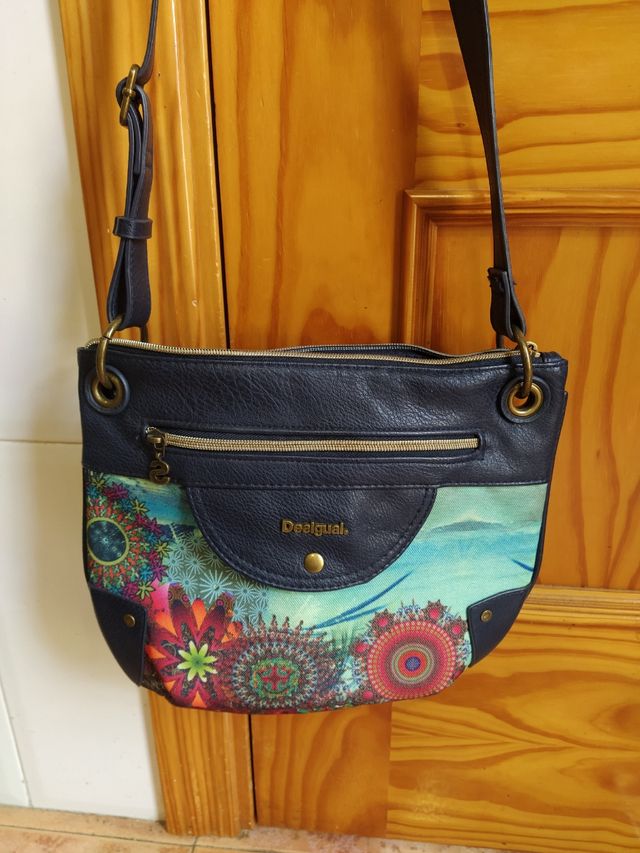 bolso desigual original. como nuevo