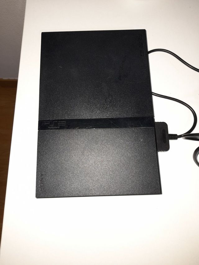 PLAYSTATION 2 MANDO Y JUEGOS INCLUIDOS