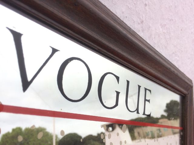 Espejo Vogue con marco se madera años 70