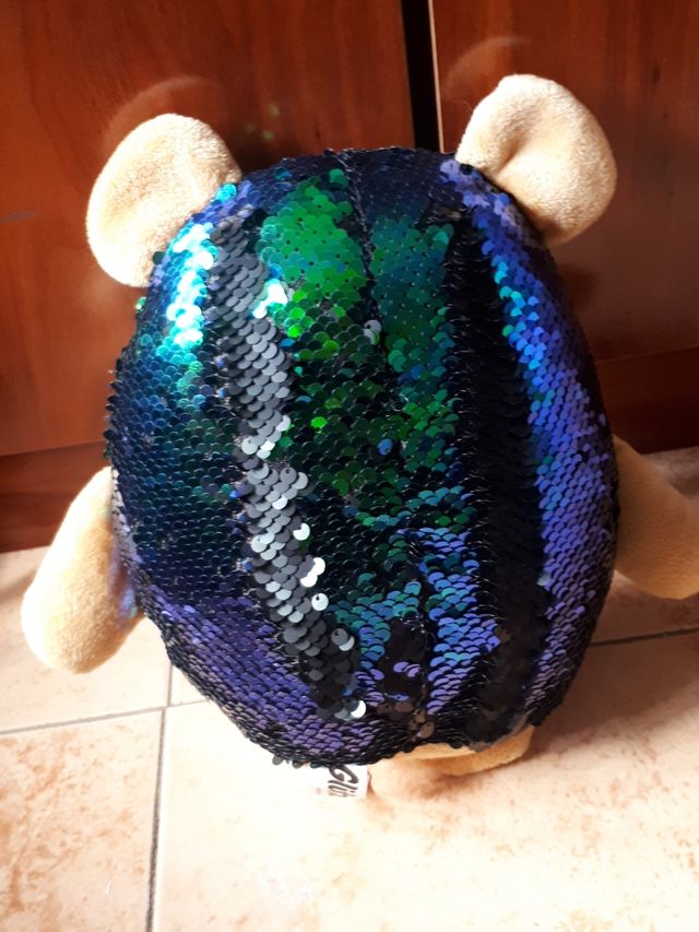 Peluche reflectante cambia de color