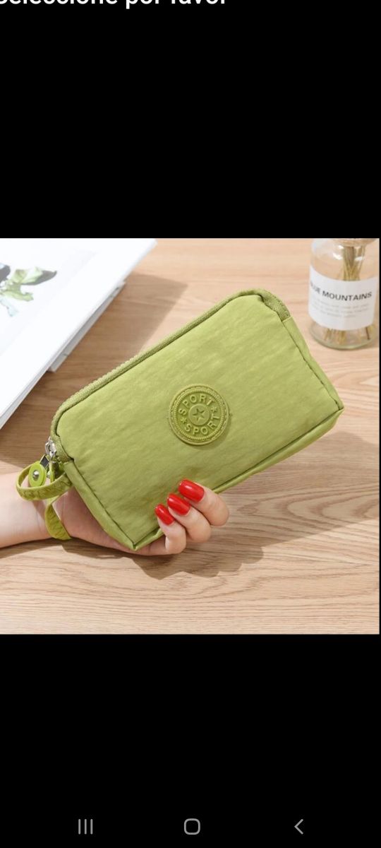 monederos de mano tres apartamentos