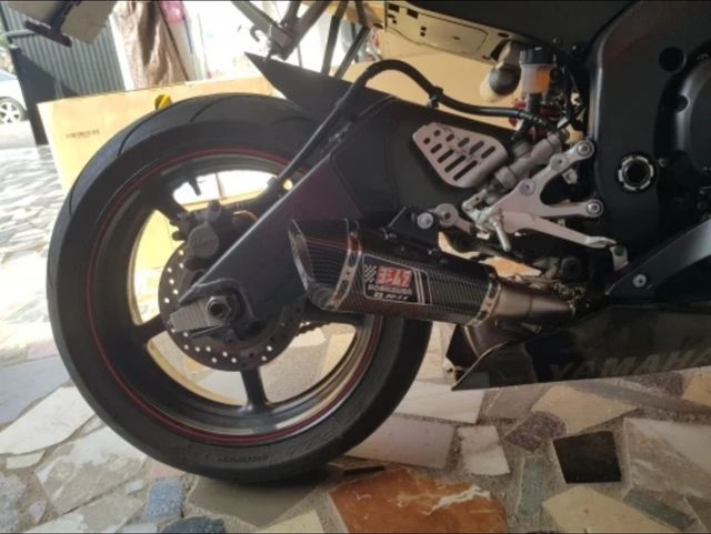 Silenciador de escape universal