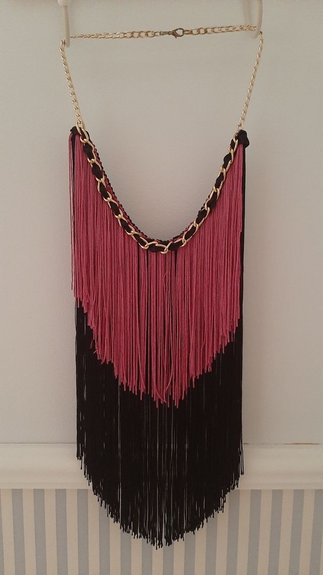 collar de flecos