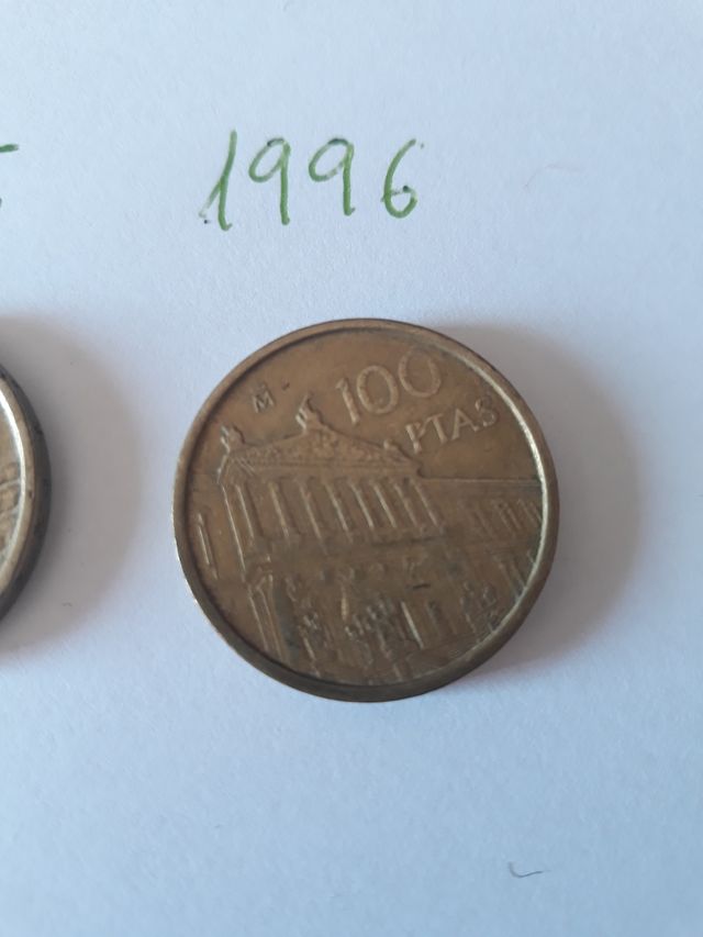 Monedas de 100 pesetas.