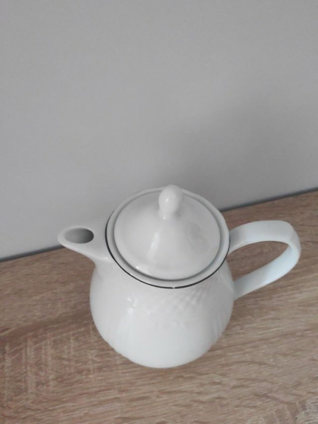 tetera cafetera jarra porcelana blanca vista