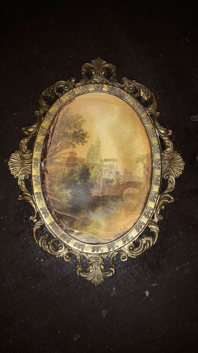 Antigua pareja cuadros metal