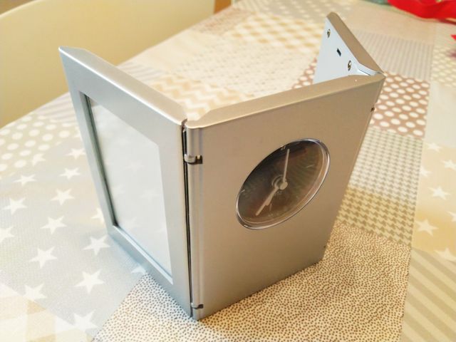 Reloj doble marco fotos.