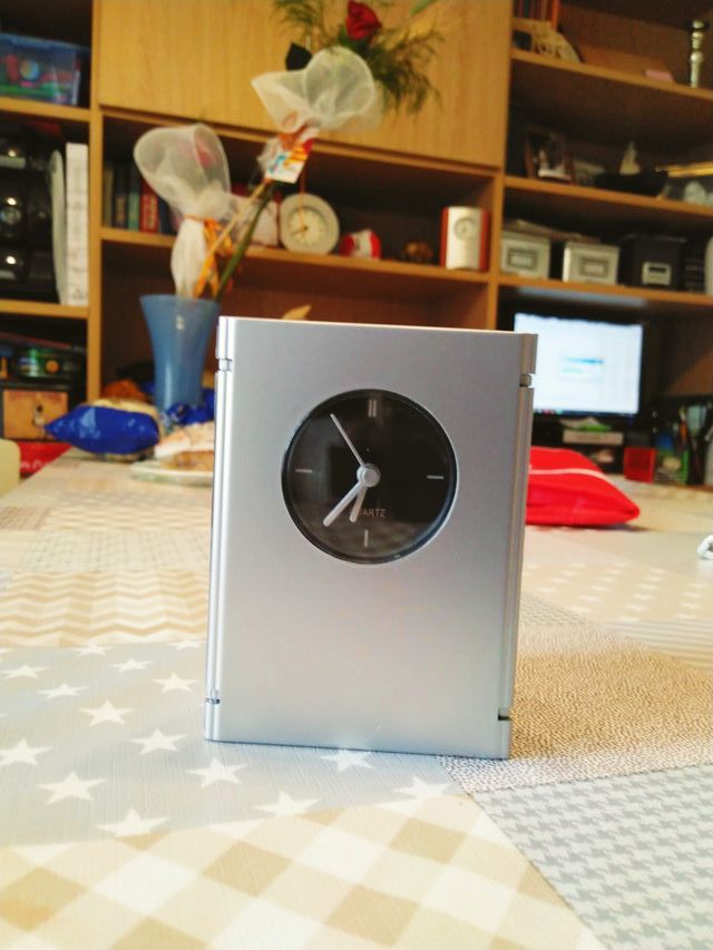 Reloj doble marco fotos.