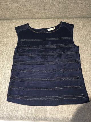 Camiseta Trucco talla 40 mujer de segunda mano por 10 EUR en Alcorcón en  WALLAPOP
