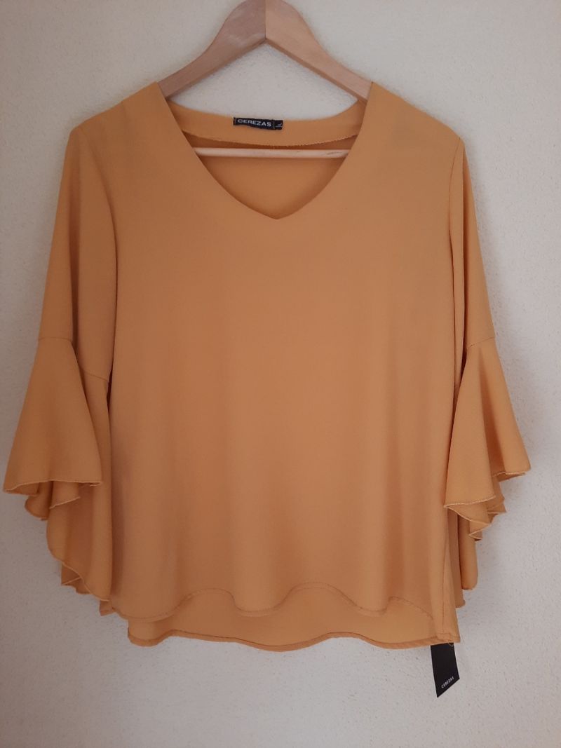 Bluson color mostaza talla L de segunda mano por EUR en