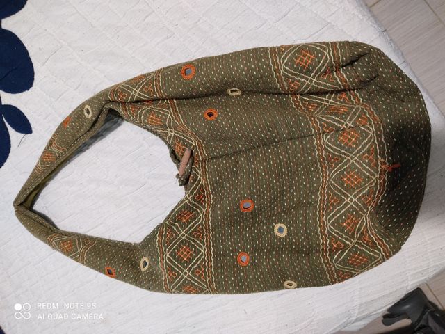 Bolso saco,tela hecho a mano. No hago envios.