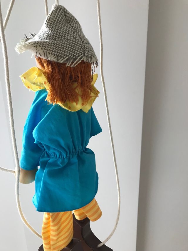 Marioneta de madera espantapájaros