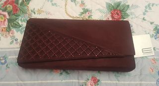 Cartera de fiesta Burdeos de segunda mano por 12 EUR en Gijón en WALLAPOP