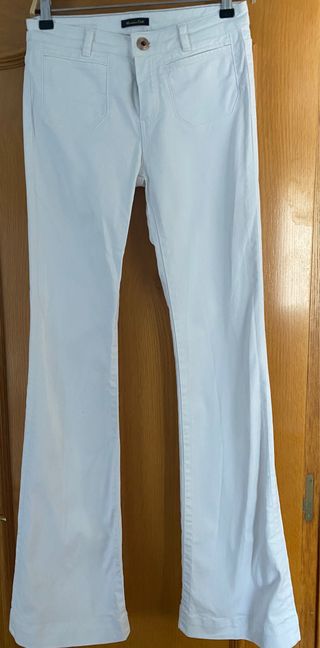 Pantalón campana Massimo Dutti 34 de segunda mano por 15 EUR en Esplugues  de Llobregat en WALLAPOP