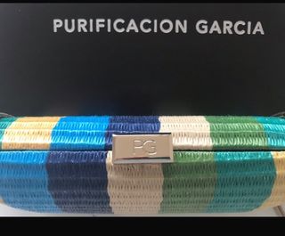 Bolso Clutch Purificación García de segunda mano por 55 EUR en Gijón en  WALLAPOP
