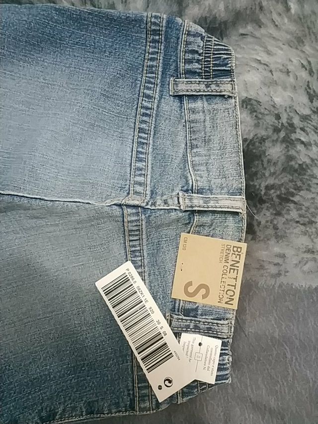 pantalón vaquero pirata niñaBenetton talla S 120cm