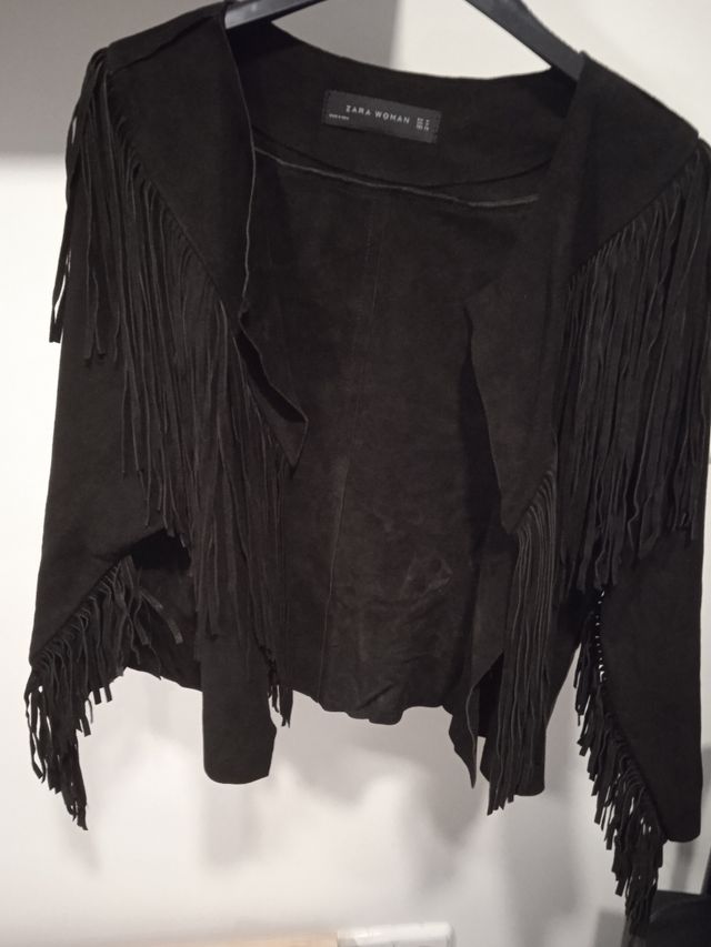 chaqueta de flecos de piel de animal