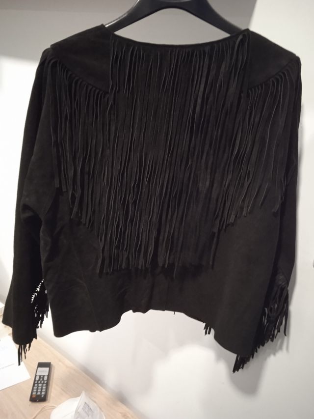 chaqueta de flecos de piel de animal