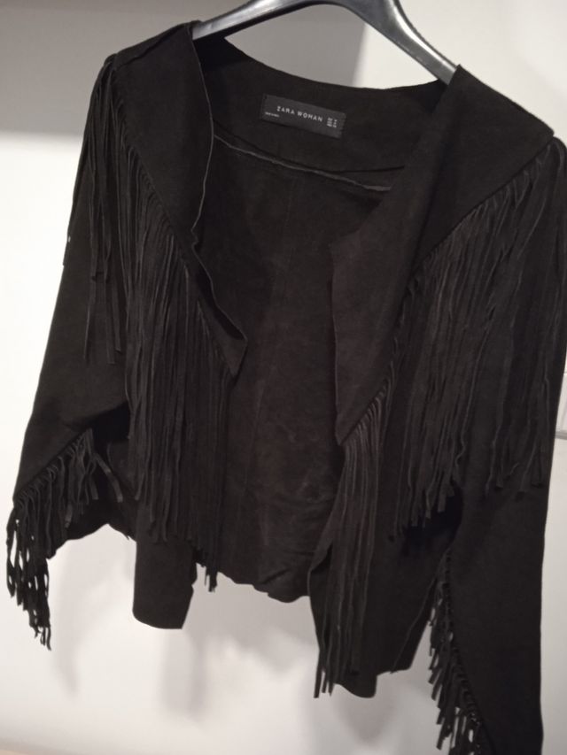 chaqueta de flecos de piel de animal