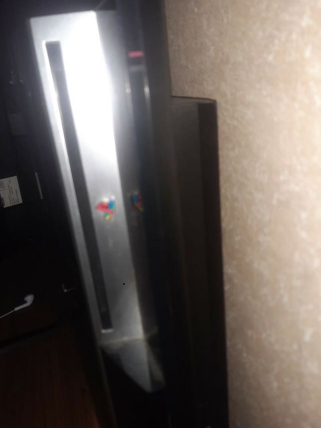 PS3 con 3 mandos y con 23 juegos