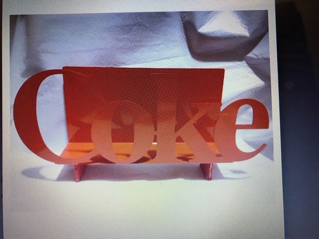 Revistero de Coca Cola