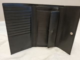 Cartera Calvin Klein piel negra de segunda mano por 35 EUR en Donostia-San  Sebastián en WALLAPOP