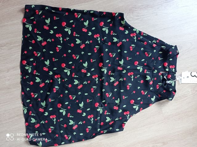 Blusa al cuello sin estrenar