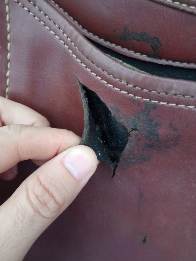 Zurron de cuero y perchas para perdices