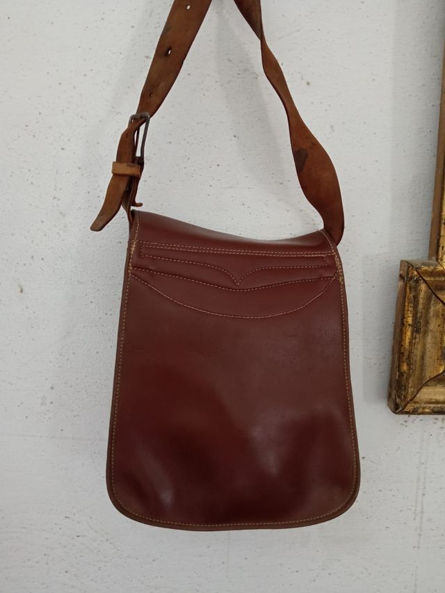 Zurron de cuero y perchas para perdices