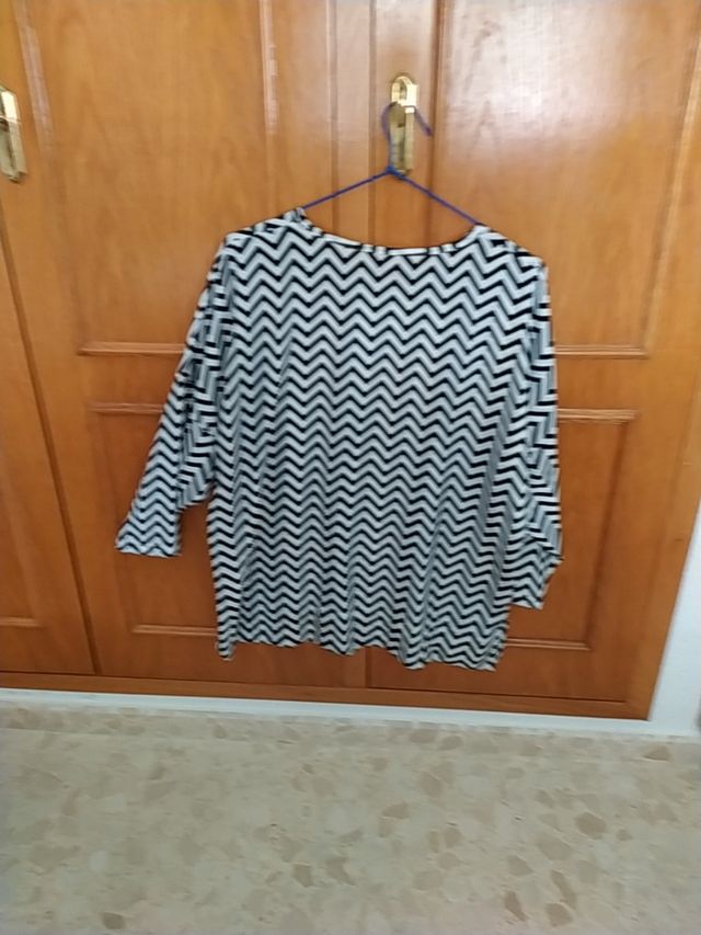 Blusa curvi olgada