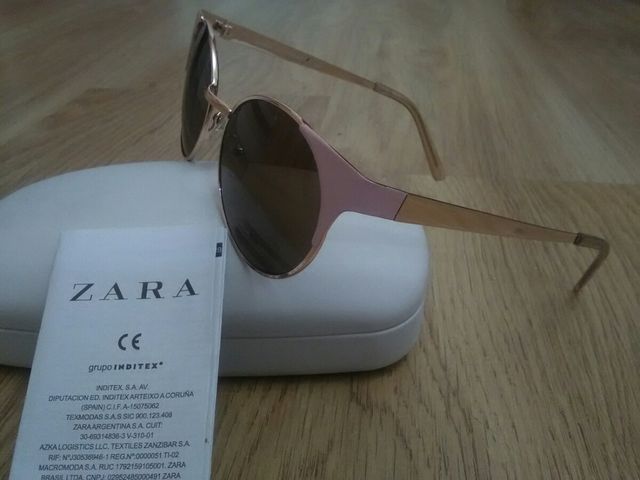 GAFAS DE SOL . Metal y rosa