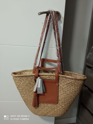 Capazo de rafia grande de Parfois. de segunda mano por 25 EUR en Alcalá de  Henares en WALLAPOP
