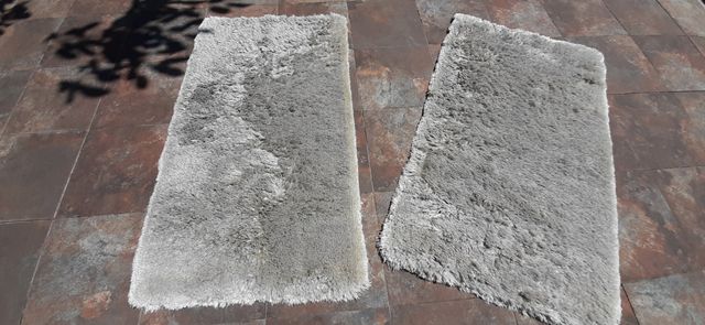 Alfombras pelo largo beige.