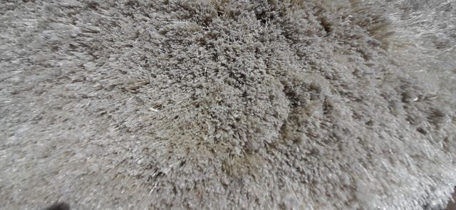 Alfombras pelo largo beige.